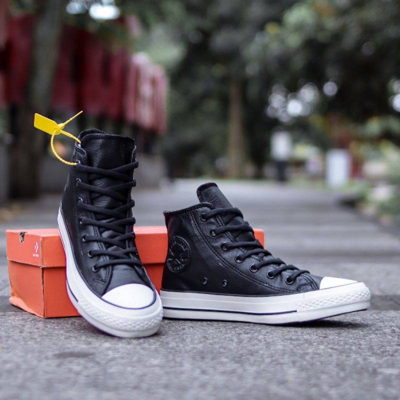 Converse cuero negro hombre new arrivals