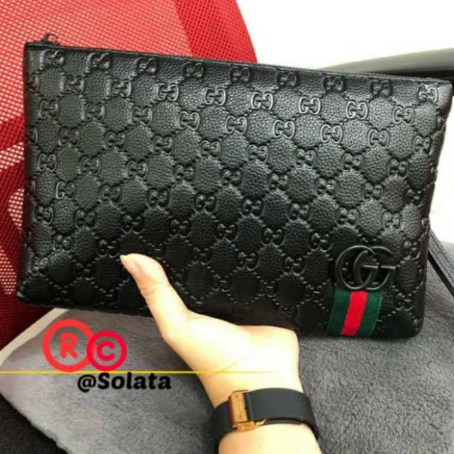 Cartera de best sale mano gucci