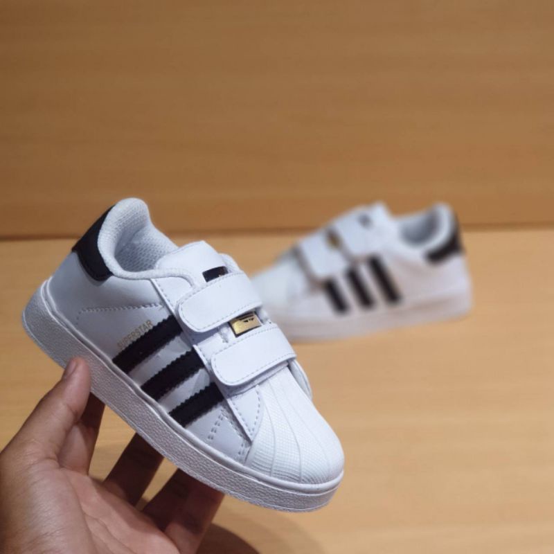 Tenis adidas superstar para niño on sale