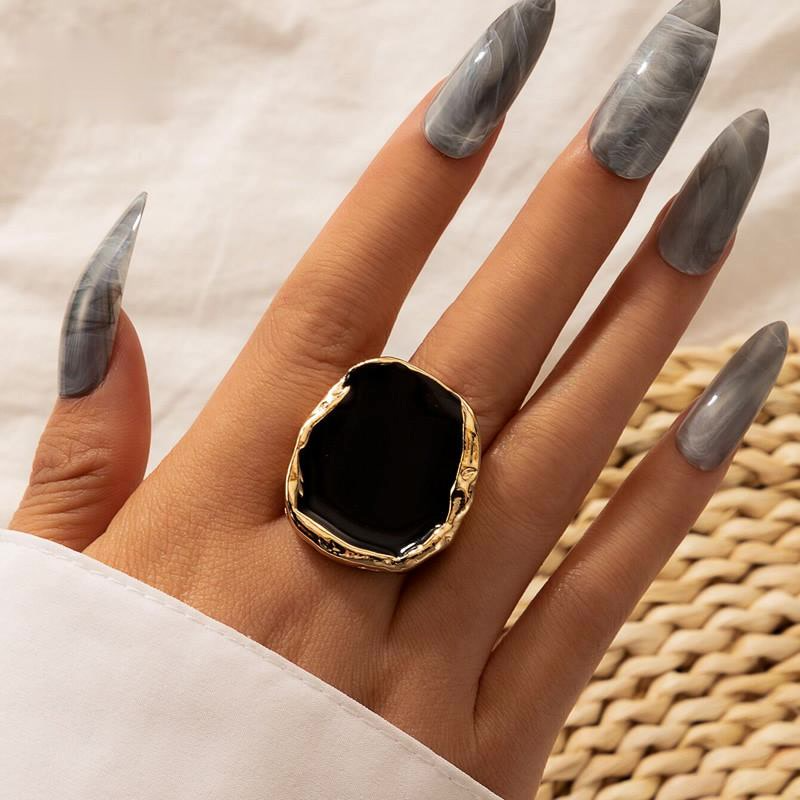 Anillo con piedra negra best sale para mujer