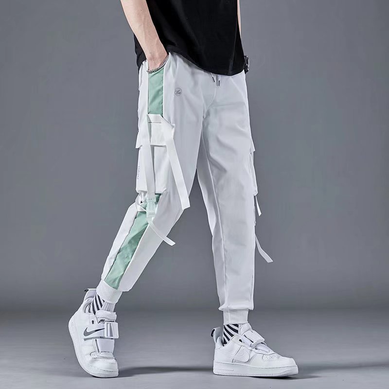 Pantalon chandal raya lateral hombre hotsell