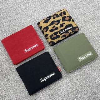 Cartera supreme precio sale